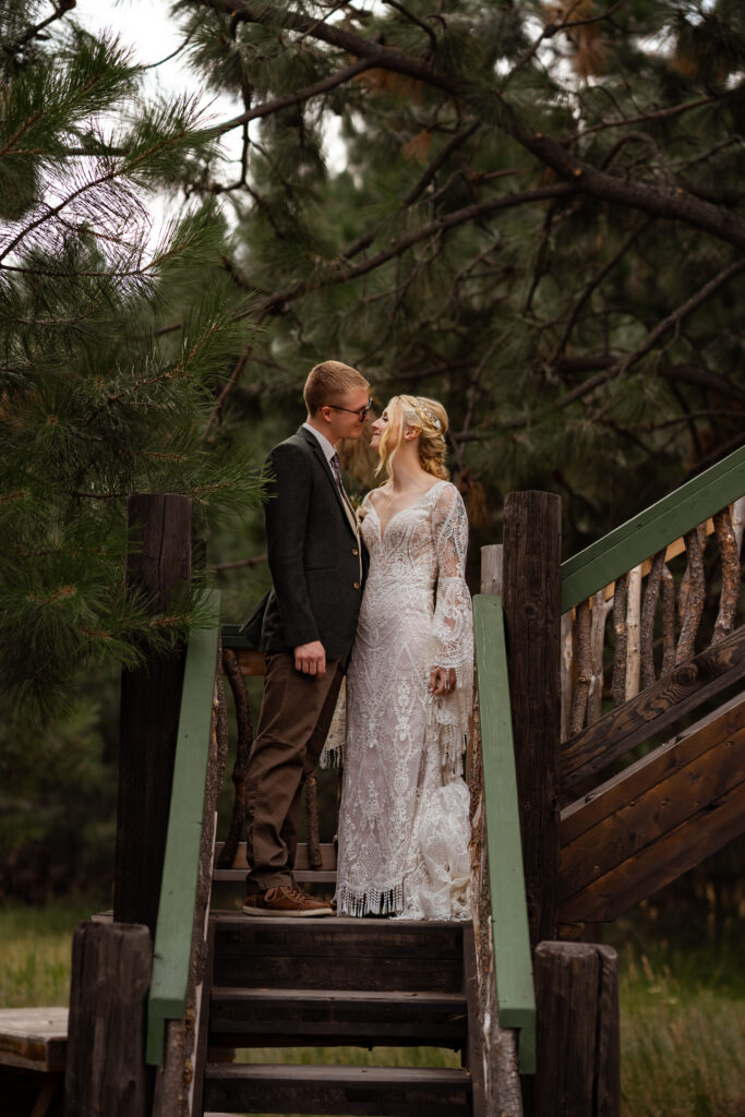 bride and groom on steps